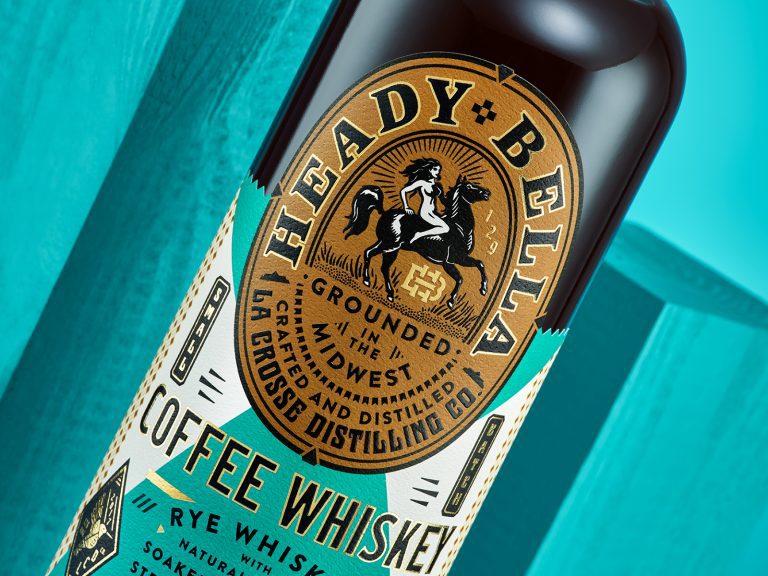 Branding, label, illustration, and products Photography for coffee liqueur made from macerated coffee and rye whiskey. Label to an illustration of a naked woman riding a horse.