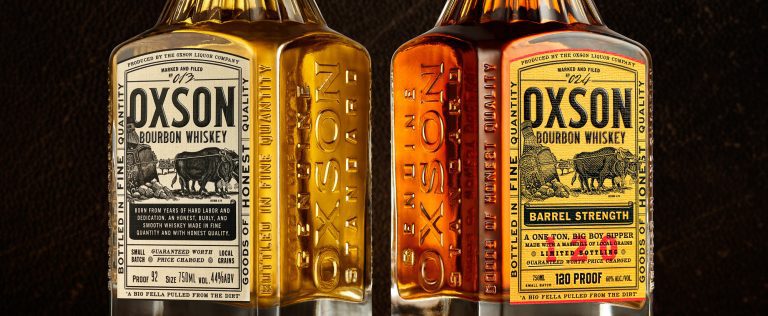 Custom glass bottle design, branding, packaging, and illustration for Bourbon Whiskey. Vintage western style, square bottle, and southern slogans.